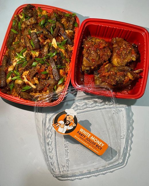 Asun and peppered chicken portions in Whitemoney Party Jollof takeaway packs